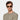 Man wearing sunglasses silk eco champagne bottle green sustainable tbd eyewear made in Italy
