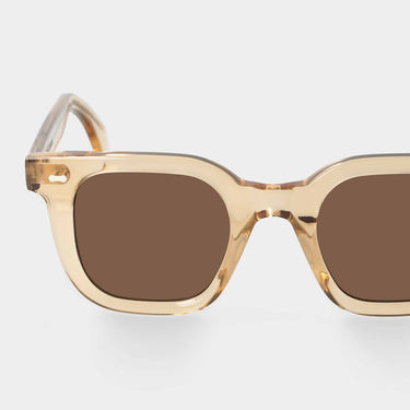 Sustainable and artisanal Mastro Eco sunglasses by TBD Eyewear, featuring a Champagne-toned frame and tobacco-colored lenses Made in Italy