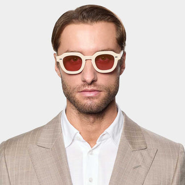 Sand squared sunglasses with red lenses: Juta | TBD Eyewear