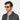 Man wearing sunglasses oxford matte champagne with tobacco lenses with bio-acetate materials tbd eyewear made in Italy
