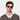 Man wearing Cran sunglasses by TBD Eyewear in Bicolor Tobacco crafted from bio-acetate and handcrafted in Italy