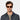 A man wearing sunglasses cran eco spotted havana tobacco made in Italy Tbd Eyewear
