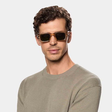 Man wearing sunglasses silk eco champagne bottle green sustainable tbd eyewear made in Italy