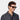 A smiling man wearing sunglasses denim eco black gradient grey sustainable tbd eyewear front handcrafted in Italy