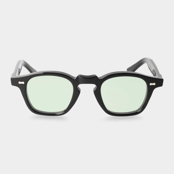 Black sunglasses with light green lenses: Cord | TBD Eyewear