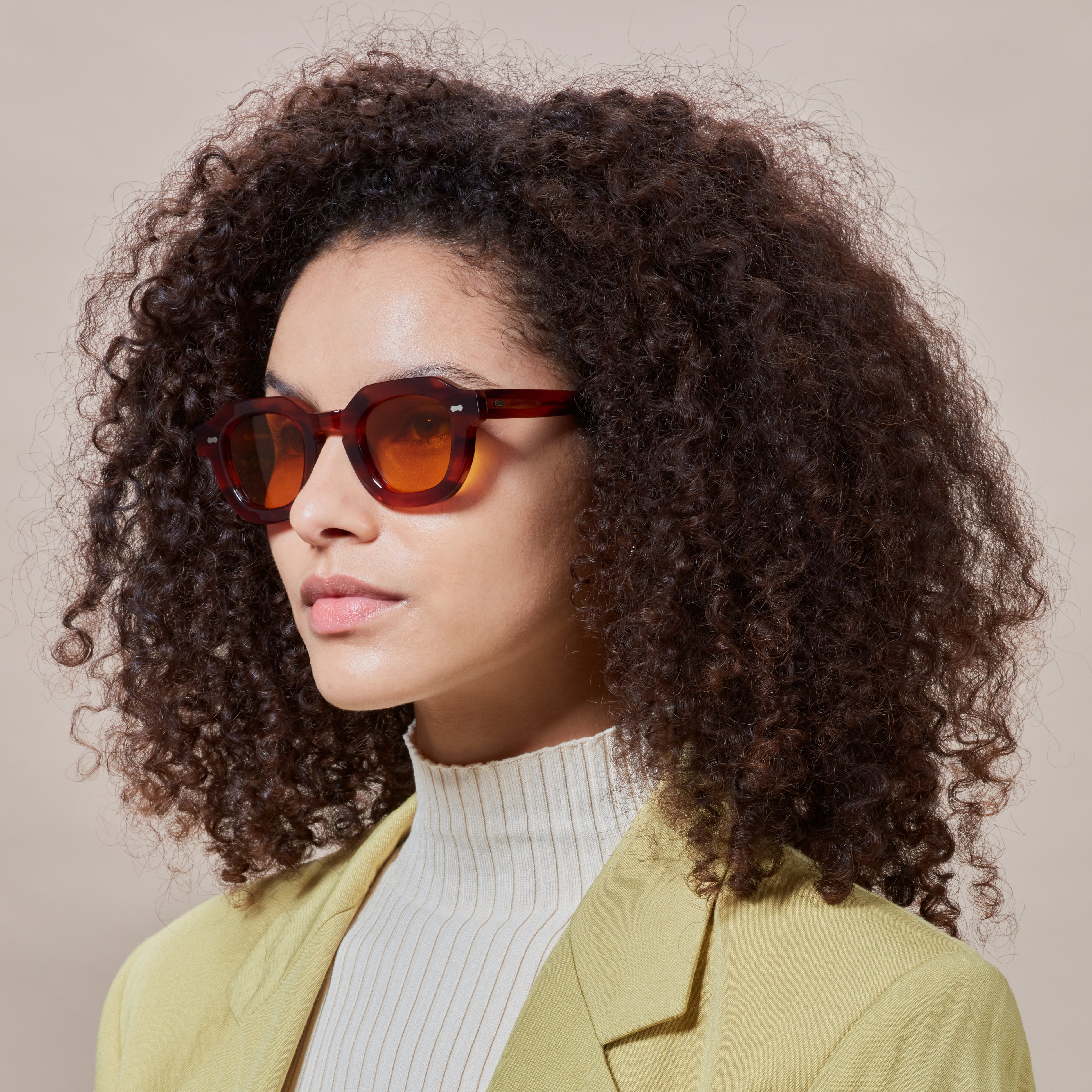 juta-eco-havana-orange-sustainable-tbd-eyewear-woman-side.