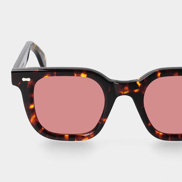 Sustainable sunglasses by TBD Eyewear Mastro Eco model in Dark Havana with handcrafted details and vibrant red lenses, Made in Italy