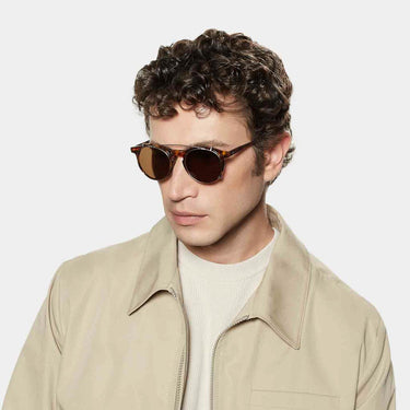 man wearing eyeglasses pleat eco spotted havana tobacco sustainable tbd eyewear  handcrafted in Italy with Clip On