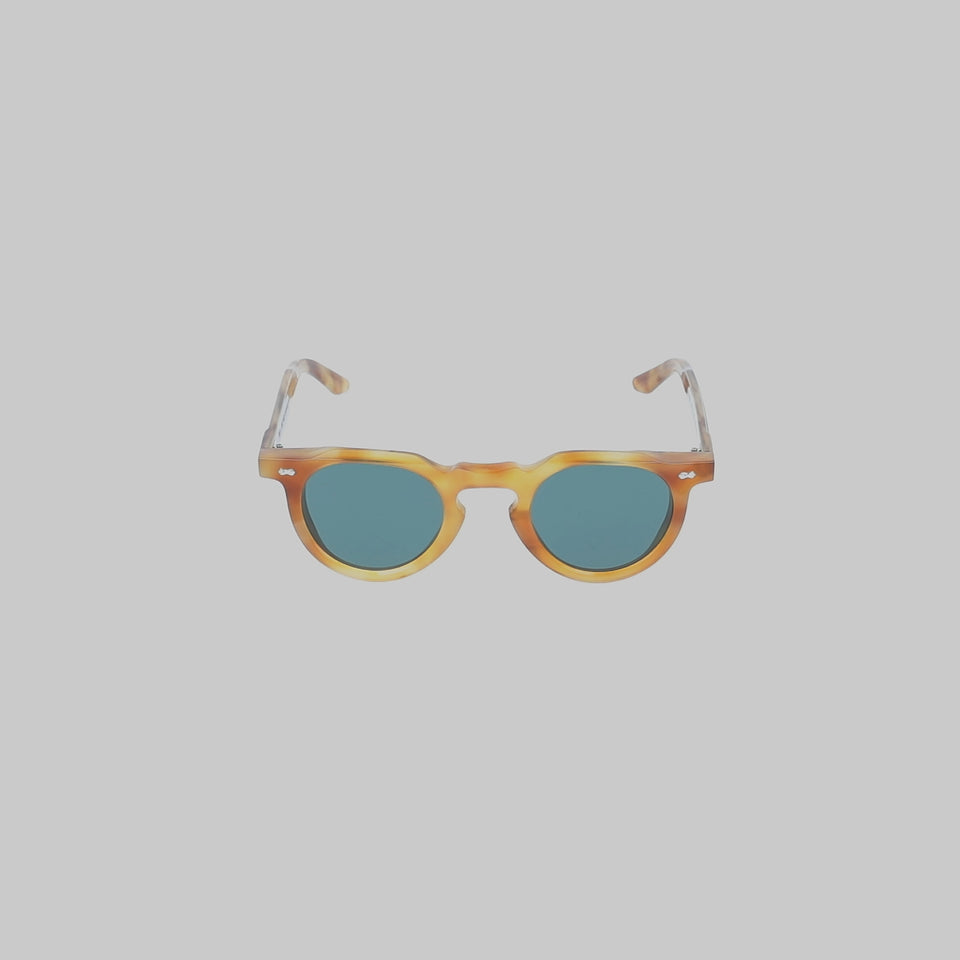 360-degree view of the Hem Eco Golden Havana Bottle Green Tailored Edition sunglasses by TBD Eyewear for Vitale Barberis Canonico, showcasing the spotted havana bio-acetate frame, bottle green lenses and signature sartorial details from every angle.
