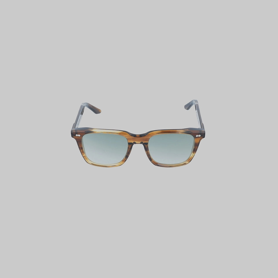 360-degree view of the Carrè Earth Bio Mirror Green Tailored Edition sunglasses by TBD Eyewear for Vitale Barberis Canonico, showcasing the Earth Bio acetate frame, mirror green lenses and distinctive sartorial-inspired details from every angle.