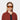 woman wearing sunglasses tela eco black orange made in Italy by tbd eyewear