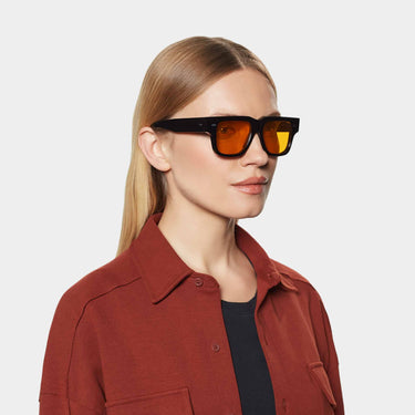 woman wearing sunglasses tela eco black orange handcrafted in Italy by tbd eyewear