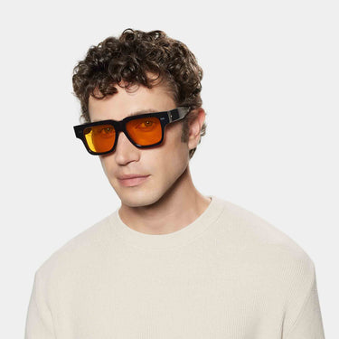 Mask sunglasses with orange lenses: Tela TBD Eyewear