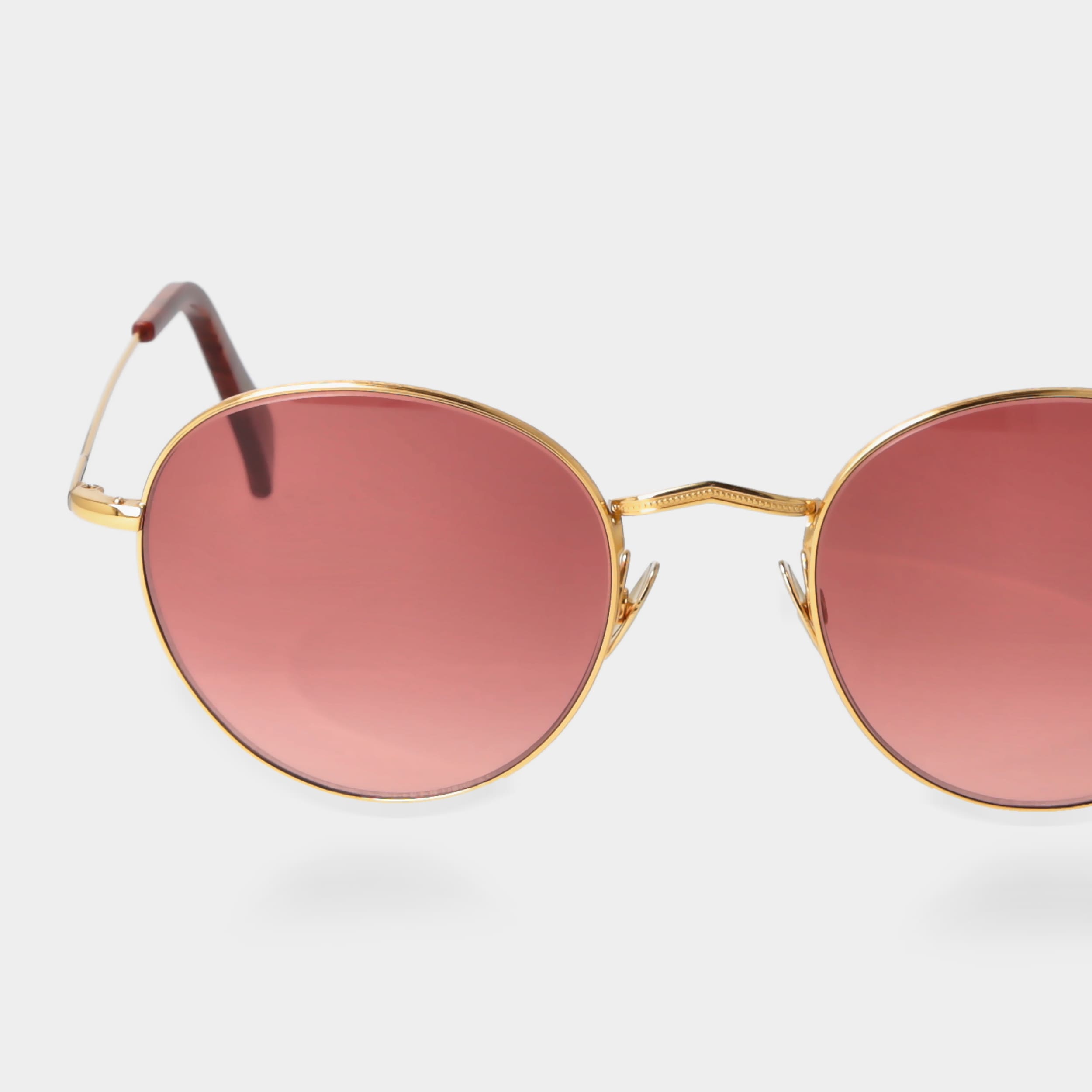 Occhiali da sole dorati lenti rosse: Vicuña TBD Eyewear