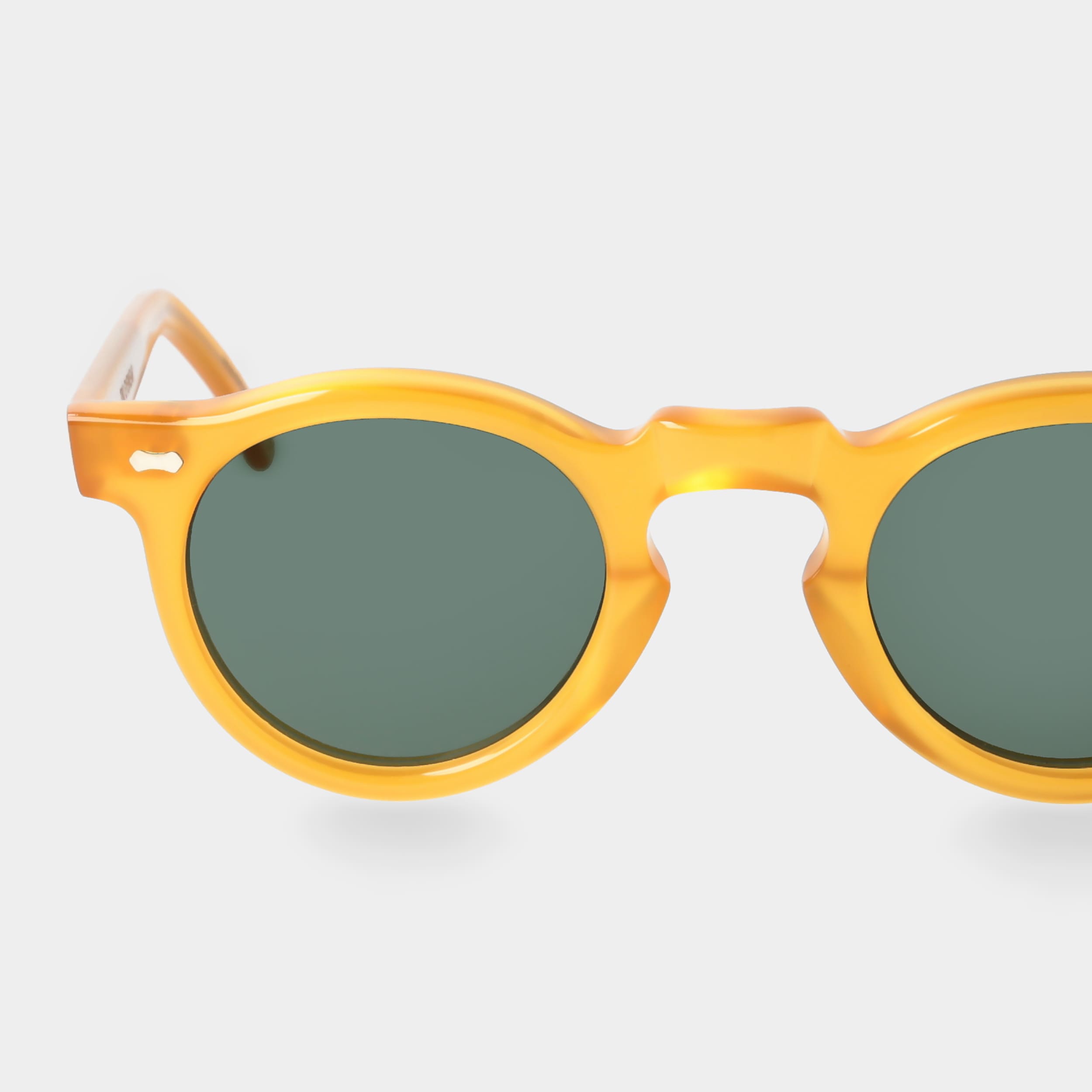 Yellow sunglasses with green lenses: Welt TBD Eyewear